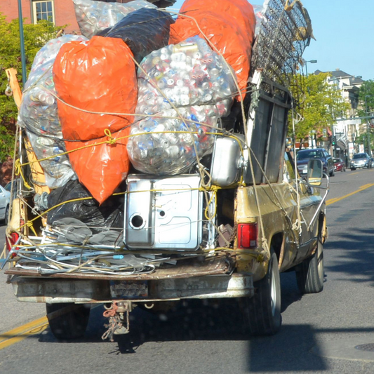 What does a load helper air bag or helper spring do?